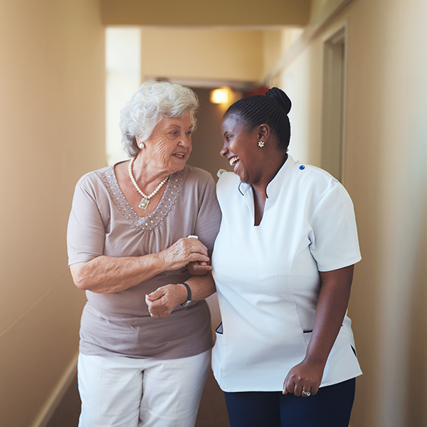 sullivan county nurse walking with a patient